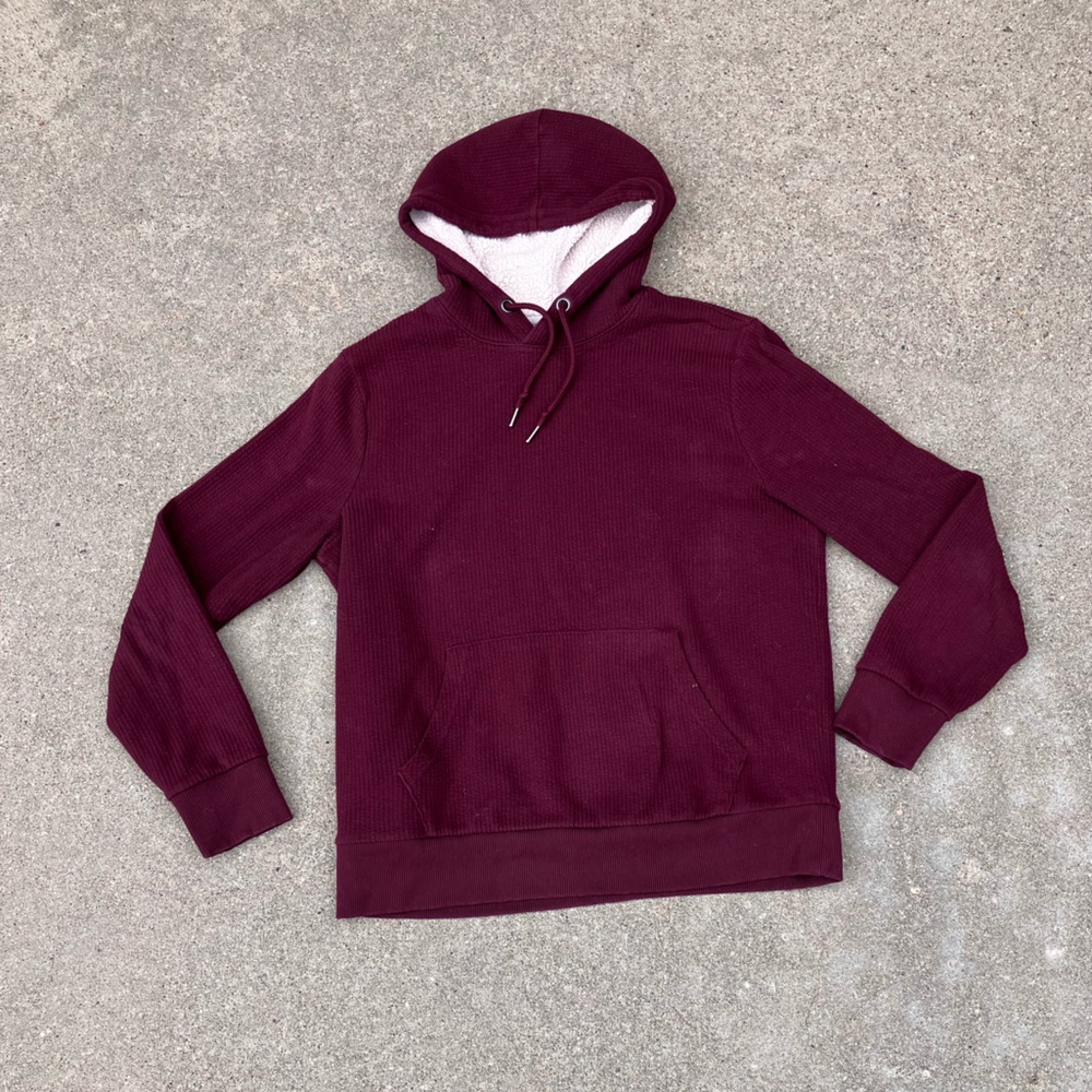 Adults hoodie with fleece lining and maroon ribbed fabric on outside. Super warm